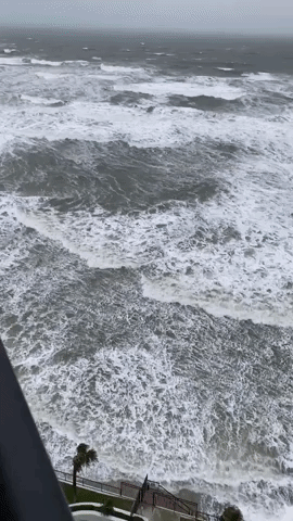 Waves Crash Against Buildings at Daytona Beach Shores as Hurricane Nicole Nears