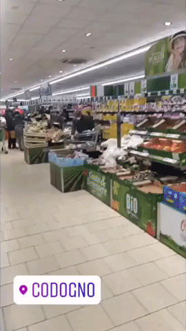 Masked Shoppers Clear Shelves in Codogno as Coronavirus Grips Italy