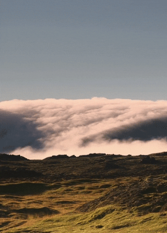 landscape clouds GIF by Head Like an Orange