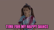 Video gif. A young girl with pigtails is doing a happy dance by putting each hand up as a sideways thumb and bopping her head and body along to the rhythm. Text, "Time for my happy dance."