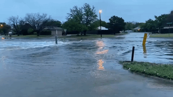 Cars Navigate Flooded Streets in Abilene, Texas