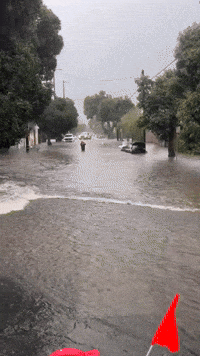 Locals Wade Through Treacherous Floodwaters in Santa Barbara