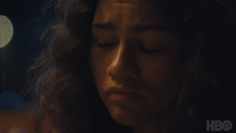 TV gif. Zendaya as Rue in Euphoria. She looks very downtrodden and upset as she pouts her lips, looking down before eventually flickering her eyes up to look at the person she's speaking with.