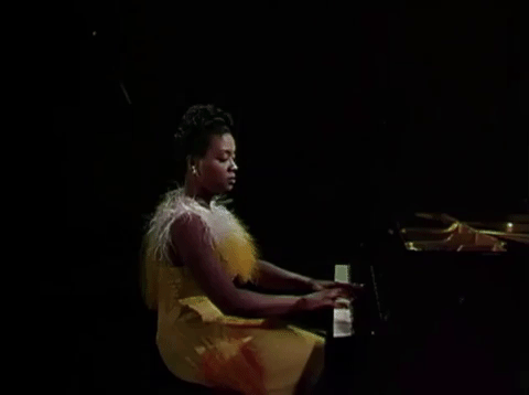 classic film piano GIF