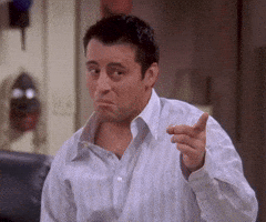 Friends gif. Matt LeBlanc as Joey looks at us and then points to his head, as if to say, “think about it.”