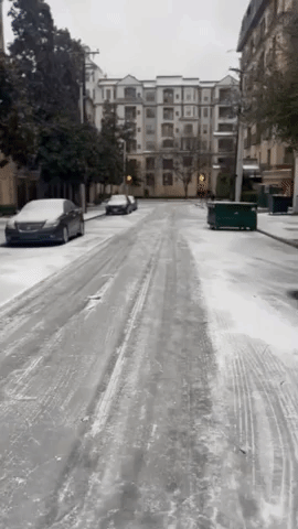 Dallas Man Tests Skating Skills on Icy Street as Winter Weather Continues