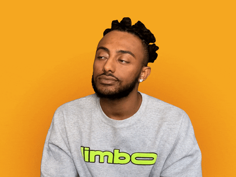 Celebrity gif. Amine looks sleepy, bringing his hands up to the side of his face and plopping his head onto them as if he is going to nap.