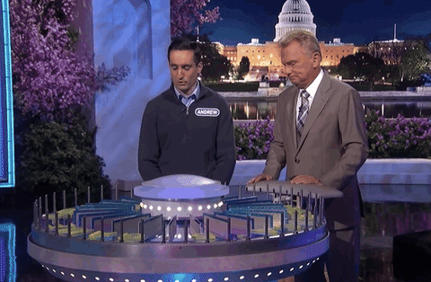 spinning GIF by Wheel of Fortune
