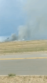 Ambulance Rushes From Scene of Explosion at Roswell Airport