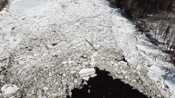 Large Chunks of Ice Float Down River in Maine