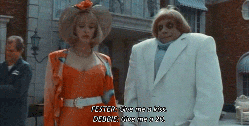 fester the addams family GIF