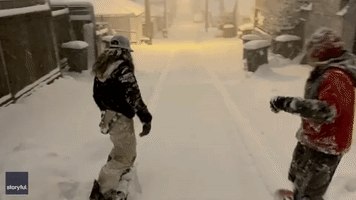 Vancouver Kids Make the Most of Winter Weather by Snowboarding Down Street