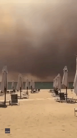 Wildfire Smoke Looms Over Beach in Manavgat, Turkey