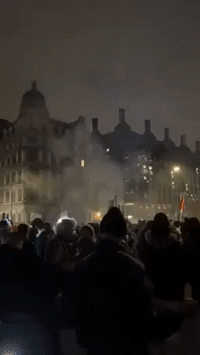 Protesters Set Off Fireworks and Clash With Police During 'Million Mask March' in London