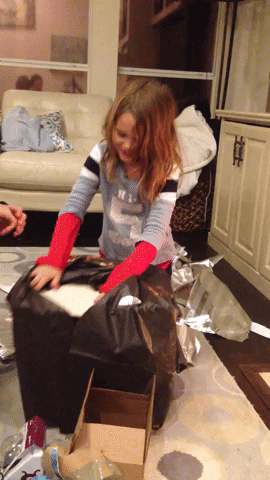 kids unwrapping GIF by America's Funniest Home Videos