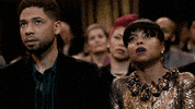 TV gif. Taraji P. Henson as Cookie and Jussie Smollett
 as Jamal in Empire. They're watching someone on stage and getting increasingly embarrassed as Cookie begins to draw a line at her throat, signaling to stop.