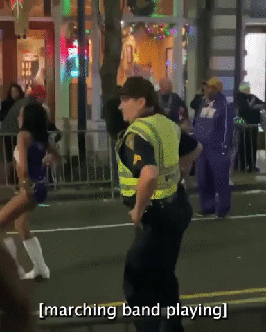 Police Officer Shows Off Dance Moves at Mardi Gras