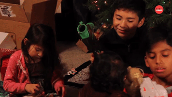 Kids Opening Presents