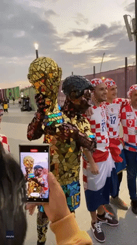 Brazil Fan Wears Dazzling Pele Costume at World Cup