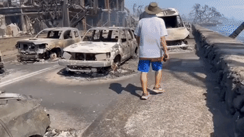 Scorched Cars Line Lahaina's Front Street After Deadly Fire Destroys Town
