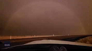 Lightning Strikes Around Rainbow in Amarillo, Texas