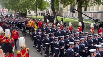 Queen's Coffin Arrives in Procession