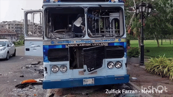 Burned-Out Buses on Colombo Street in Aftermath of Violent Protests