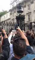 Crowd Boos and Chants Amid UK PM Resignation