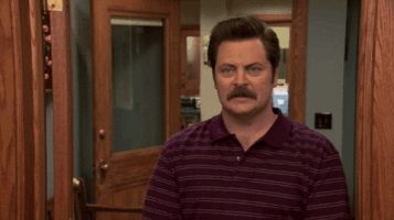 Parks and Recreation gif. Nick Offerman as Ron speaks to us matter-of-factly with closed eyes, "This is my hell."