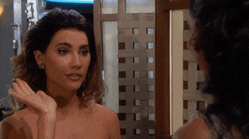TV gif. Jacqueline MacInnes Wood as Steffy in The Bold and the Beautiful smiles and gives a woman a high five.