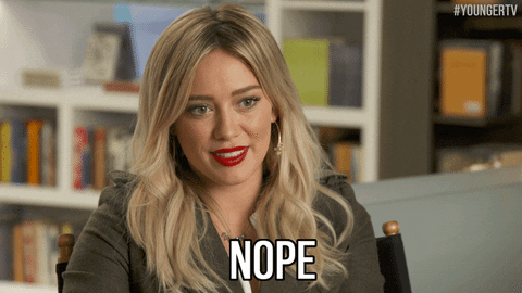 TV gif. Hilary Duff as Kelsey Peters on Younger shaking her head and looking blank, saying "nope."