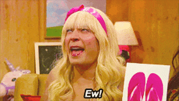 Tonight Show gif. Jimmy Fallon is wearing a pink bowtie headband and blonde wig and his lips are ultra glossy. He looks up and says, "Ew!" as he lets his jaw hang open for emphasis.