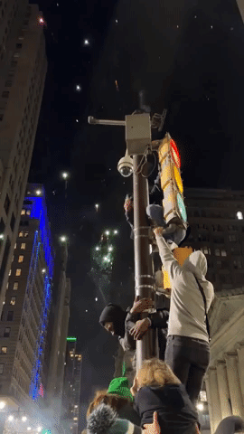Philadelphia Eagles Fans Climb Pole