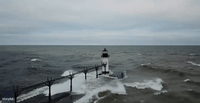 'Huge' Waves Slam Into Lighthouse on Lake Michigan