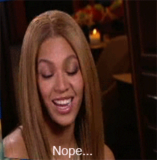 Celebrity gif. Beyonce shakes her head and politely smiles as she says, “Nope…”