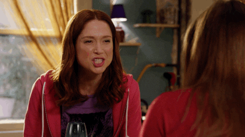 TV gif. Ellie Kemper as Kimmy Schmidt in The Unbreakable Kimmy Schmidt leans forward, smiles and winks as she emphatically tells someone "you rock," which appears as text.