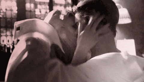 couple kissing GIF