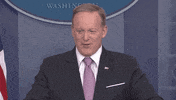 news sean spicer upside down flag GIF