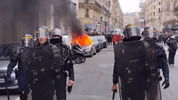 Police Line Parisian Streets as Pension Reform Strikes Continue