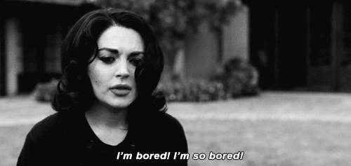 Movie gif. Lindsay Lohan, playing Liz Taylor in the movie Liz and Dick, yells, "I'm bored! I'm so bored!"