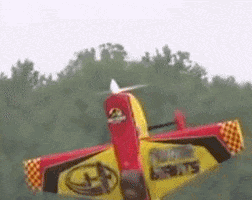 Video gif. A toy plane is spinning in the sky and a distraught face is edited on the bottom.