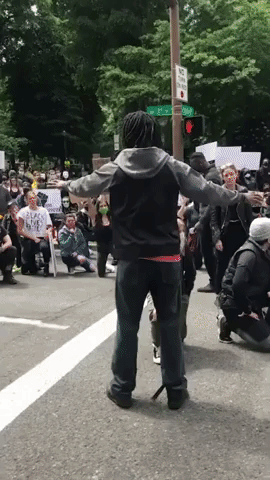 Portland Police Kneel in Solidarity With Black Lives Matter Protesters