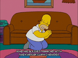 The Simpsons gif. Homer kneeling and praying in front of a couch. Text, "who has blessed mankind with two kinds of clam chowder."