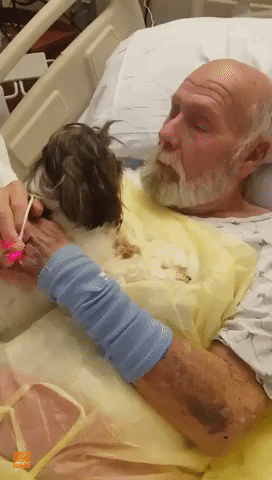 Sweet Dog Gives Snuggles to Owner's Dad in Hospital