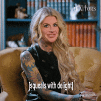 Sponsored gif. Traitors cast member Carolyn Wiger smiles and squeals with delight. Text reads, “Squeals with delight.”