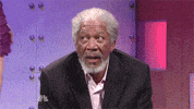 SNL gif. Morgan Freeman reacts during the “What up with that” skit, looking perplexed.