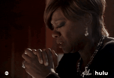 TV gif. Viola Davis as Annalise on How to Get Away With Murder holds her hands together as if she’s praying and looks down with tears streaming from her eyes.