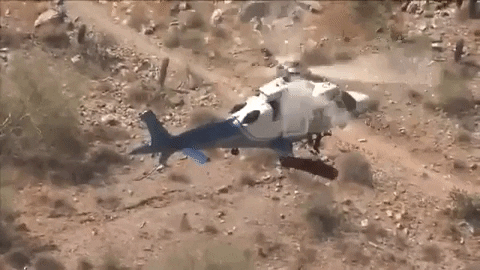 giphygifmaker woman arizona helicopter flipping GIF