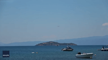 Jet Lands Dangerously Close to 'Planespotters' at Greek Airport