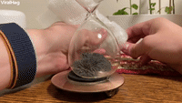 Strong Magnet Shatters Hourglass